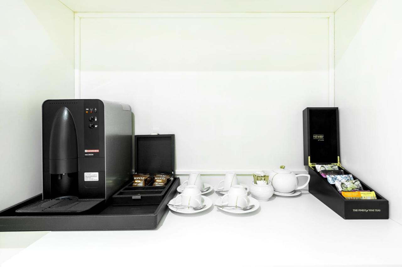 Rixos Khadisha Shymkent Hotel Eksteriør billede A coffee machine